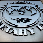 The International Monetary Fund logo is seen outside the headquarters building in Washington, U.S. September 4, 2018. REUTERS/Yuri Gripas/File Photo